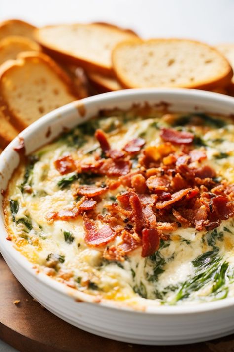 A close-up view of a bowl filled with creamy Bacon Spinach Dip, garnished with extra crumbled bacon and parsley. Cheesy Bacon Spinach Dip, Slow Cooker Spinach Dip, Spinach Bacon Dip, Bacon Spinach Dip, Thanksgiving Vegetables Side Dishes, Dip Recipes Crockpot, Easy Christmas Dinner, Summer Crockpot Recipes, Thanksgiving Appetizers Easy