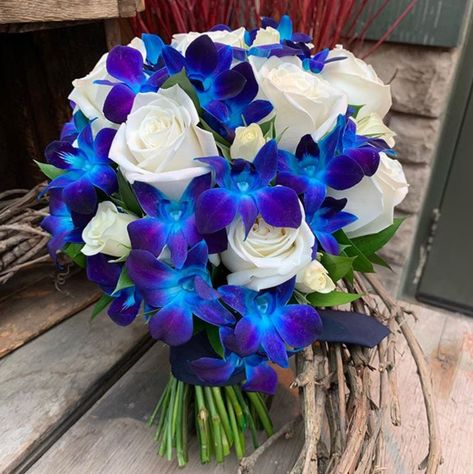 White Roses And Blue Orchid Bouquet, Blue Orchid Tattoo, Blue Orchid Bouquet, White Rose Centerpieces, Blue Orchid Wedding, Beach Wedding Purple, Blue Dendrobium Orchids, White Tulip Bouquet, Orchid Bridal Bouquets