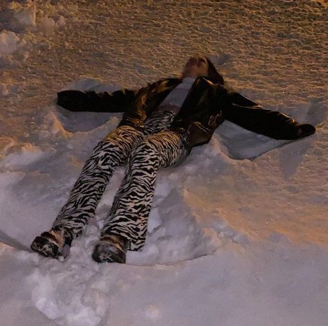 snow//angel//fun//outfit//striped//zebra//flares//jeans//trousers//leather//jacket//friends//laugh//funny//snowy//ideas//inspo//activity//games//inspiration// Zebra Trousers, Zebra Print Pants, Trouser Outfit, Snow Angel, Friends Laughing, Snow Angels, Game Inspiration, Print Pants, Activity Games