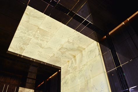 Backlit onyx wall and ceiling feature at the Mansions at Acqualina Room Divider Doors, Floating Staircase, Ceiling Treatments, Stone Panels, Suspended Ceiling, White Onyx, Flooring Materials, Ceiling Panels, Wall Installation