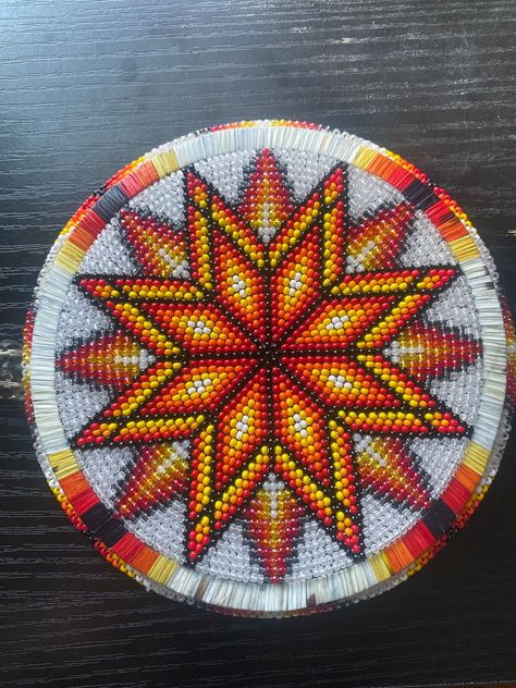 A beautiful traditional beaded medallion with a quill ring on a white background with red, orange, yellow and black. The medallion is 5in diameter Medallion Pattern Design, Beaded Madellion, Beaded Medallion Patterns, Native American Beadwork Earrings, Beaded Barrettes, Beaded Medallion, Quill Work, Beading Earrings, Beadwork Ideas