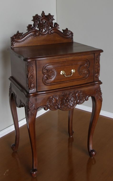 Intricately hand carved French Rococo Bedside with pediment. Hand crafted from solid mahogany and finished with a wax polish to  enhance the colour of the wood. Available from Lock Stock and Barrel Furniture. Hand Carved Wood Furniture, Rococo Bedside Table, Polish Furniture, Victorian Style Furniture, Meja Nakas, Hand Carved Furniture, Rococo Furniture, Wood Carving Furniture, Brass Swan