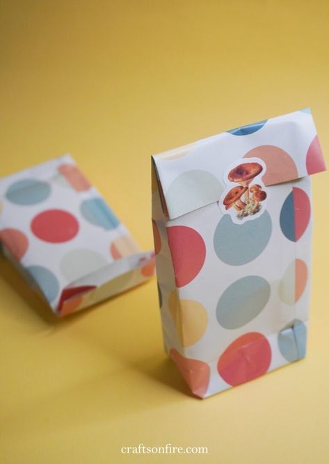 How To Make A Gift Bag From Patterned Paper - Craftsonfire How To Make A Small Paper Bag, Easy Paper Gift Bags Diy, How To Make Small Gift Bags, How To Make A Paper Bag Step By Step, Diy Small Bag, Diy Gift Bags Paper, Origami Gift Bag, Make A Gift Bag, How To Make A Gift Bag