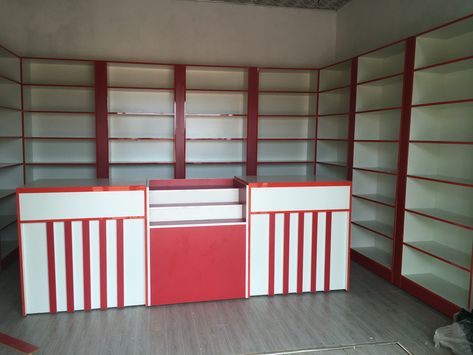 This pharmacy shelves design can also be used for our the counter medicine shop Pharmacy Shelf Design, Pharmacy Shelves Design, Pharmacy Shelves, Home Office Dark, Office Dark, Pharmacy Decor, Down Ceiling Design, Shelves Design, Pharmacy Design