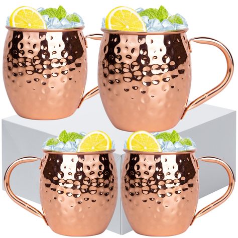 PRICES MAY VARY. Timeless Elegance Redefined: Elevate your drinkware collection with the irresistible charm of BACANA Moscow Mule Mugs. Crafted with precision and passion, these stunning copper-plated stainless steel mugs exude sophistication, making them the perfect addition to any occasion, from cozy nights in to extravagant celebrations. Unparalleled Durability for Lasting Memories: Immerse yourself in the art of cocktail culture with confidence, knowing that each sip from these meticulously Mocktails Non Alcoholic Thanksgiving, Moscow Mule Gift Basket, Moscow Mule Gift, Moscow Mule Cups, Mule Mugs, Moscow Mule Cocktail, Moscow Mule Recipe, Copper Moscow Mule Mugs, Thanksgiving Cocktails