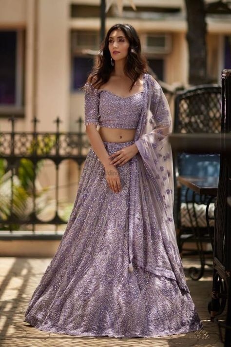 Latest Lavender Outfits for Brides. #weddingbazaar #indianwedding #lavenderlehenga #lavenderlehengabridal #lavenderlehengapastel #lavenderlehengacombination #lavenderlehengasimple #lavenderlehengapartywear #lavenderlehengapurple #lavenderlehengacholi #lavenderlehengalight #lavenderlehengadark #purplelehenga #purplelehengabridal #purplelehengalight #purplelehengadark #purplelehengapastel #purplelehengadesigns #lilaclehenga #lavendersaree #lavendersharara #lavendergown #lavendersareesilk #lilac Pastel Lavender Lehenga, Lavender Outfits, Lehenga Simple, Lehenga For Engagement, Lavender Lehenga, Indo Western Outfits For Women, Lavender Outfit, Engagement Dress For Bride, Stop Obsessing