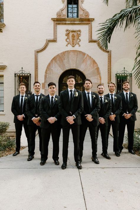 Dashing groom with his groomsmen l Image by Grace Torres Groom And Groomsmen Attire Black, Black And White Groomsmen, Black Tie Groomsmen, Groomsmen Attire Black, Powel Crosley Estate Wedding, Church Wedding Dress, All White Wedding, Groom And Groomsmen Attire, Wedding Dress With Veil