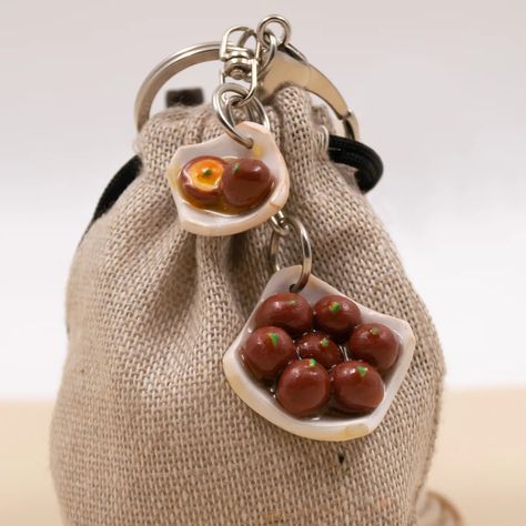 Are you a foodie with a sweet tooth? Then this handmade clay gulabjamun platter keychain is a must-have! It's not only cute and adorable, but it's also a great way to add a touch of personality to your keys or handbag. So what are you waiting for? Order yours today! Show your love for gulabjamun with this adorable keychain. Order now! Food Miniature - Gulab Jamun Dessert Delights 🍩✨ Product -Gulab Jamun Dessert Delights Keychain🍩✨ Handcrafted cute and sturdy clay product. Proudly Indian ... Gulab Jamun, Indian Sweet, Handmade Clay, Today Show, Sweet Tooth, Diy Projects, Miniatures, Dessert