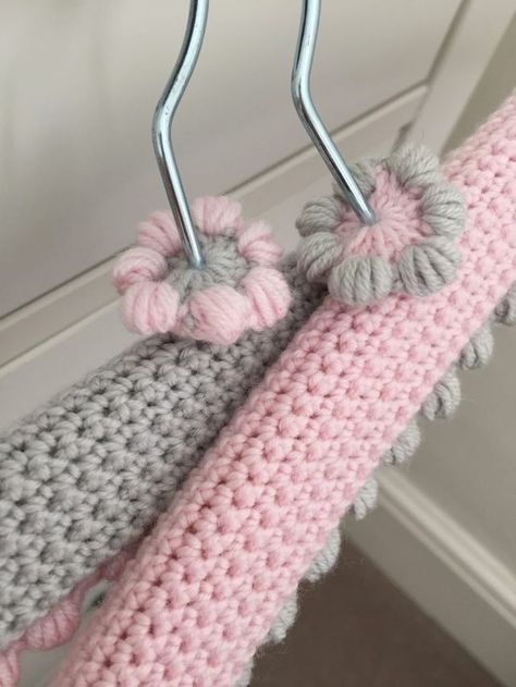 LoveCrochet |  Adding crochet is a wonderful way to make any household object pretty. Kate Eastwood has transformed some old wooden hangers with a whoosh of her hook!  Our grandmothers would have scol Crochet Hangers, Hanger Covers, Covered Coat Hangers, Bobble Crochet, Baby Hangers, Pretty Crochet, Crocheting Ideas, Wedding Hangers, Coat Hangers