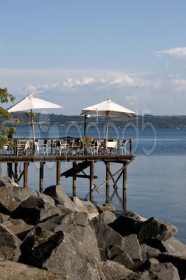 terrace on the lake - Stock Photo | by eZeePicsStudio Italy Terrace, Lazio Italy, France Travel, Patio Umbrella, Places To Travel, Gazebo, Rome, Terrace, Royalty