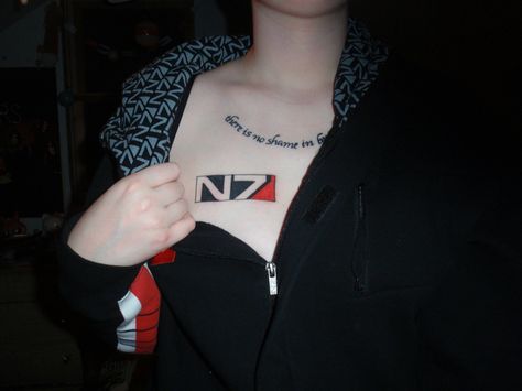 N7 mass effect tattoo N7 Tattoo, Mass Effect Quotes, Mass Effect Tattoo, Mass Effect N7, Mass Effect Cosplay, Sleeve Inspiration, Nerdy Tattoos, Gamer Tattoos, Nice Tattoos