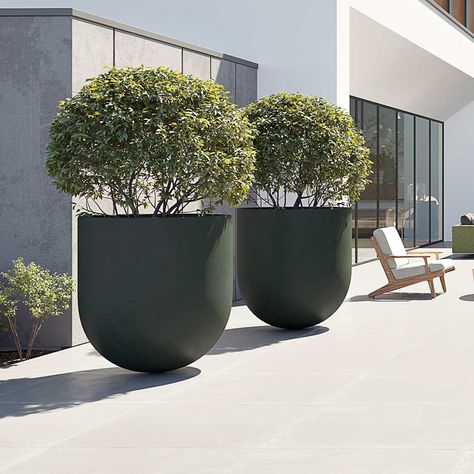 Jumbo Lex Refined Planter - Pine Green    Add a little drama to your space with the Jumbo Lex Refined Planter. This large planter in a luxurious Pine Green colour has a round bottom and cylindrical shape for a sleek and stylish contemporary look.  Despite its large size, it is surprisingly lightweight and sturdy, making it a reliable option for supporting whatever you choose to grow in it while adding a touch of sophisticated style to your space - on a grand scale.   Material: Sandstone resin wi Extra Large Planters, Outdoor Garden Planters, Modern Pot, Plant Pot Decoration, Tall Planters, Outdoor Plant, Big Plants, Decorative Pots, Indoor Plant Pots