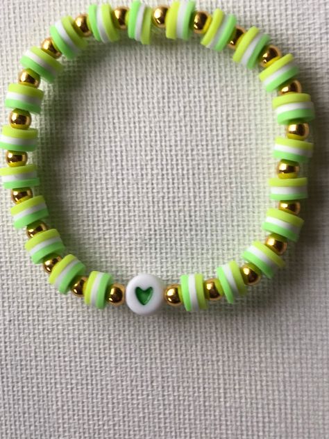 These handmade bracelets are stretchable so they should fit most children's and adults' wrist comfortably :) SIZING: these bracelets are approximately 16-18cm  If you have any further questions please email: beadsbytegh77@gmail.com Cute Green Bracelet Ideas, Green Bracelet Ideas, Lime Green Bracelet, Pulseras Ideas, Preppy Bracelets, Homemade Bracelets, Green Beaded Bracelets, Bracelets Ideas, Polymer Clay Bracelet