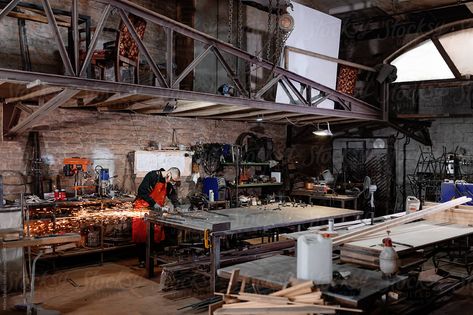 Metal Worker In Spacious Industrial Workshop | Stocksy United Brick Workshop, Workshop Architecture, Steel Workshop, Industrial Workshop, Warehouse Living, Metal Workers, Training Facility, Metal Workshop, Workshop Design