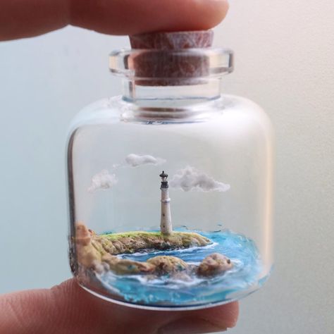 the world in a bottle ^o^ (@nj_huang) • Foton och videor på Instagram Miniature Lighthouse, Tiny Jars, Jar Art, Clownfish, Diy Watercolor Painting, Miniature Bottles, Art Decor Diy, Miniature Rooms, Glass Bottle Crafts