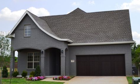 dark gray painted exterior house - 5 ways to finish brick Gray Painted Brick House, Grey Painted Brick House, Gray Brick House Exterior, Grey Brick House Exterior, Grey Painted Brick, Grey Brick Houses, Painted Brick Exteriors, Dark Grey Paint, Painted Brick House