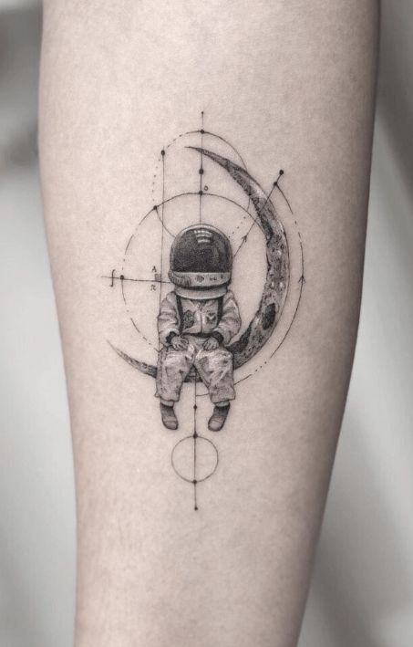 40 Stunning Astronaut Tattoo Designs For Men And Women Geometric Tattoos For Men, Astronaut Tattoos, Geometric Tattoo Leg, Tato Geometris, Science Tattoos, Astronaut Tattoo, Sketch Style Tattoos, Planet Tattoos, Wrist Tattoos For Guys