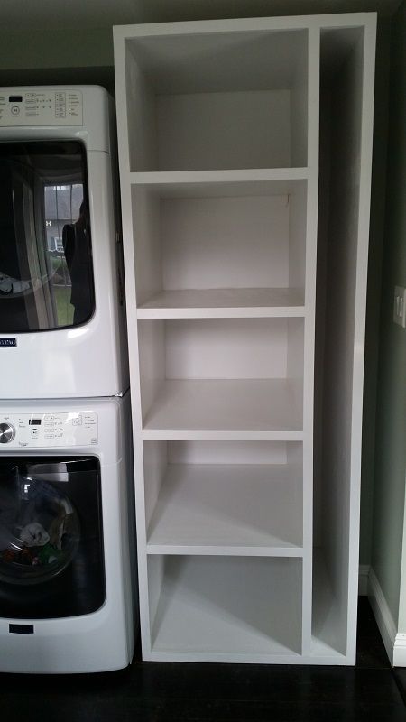 Customer was looking to add organization and storage to a laundry room. A tall cabinet was designed to fit next to the washer/dryer to accommodate laundry baskets, as well as miscellaneous cleaning supplies. In addition, storage lockers were built to accommodate the kids' school/outdoor clothing and footwear, as well as providing bench seating for putting on shoes. Laundry Room Closet Ideas, Room Closet Ideas, Laundy Room, Stacked Laundry Room, Small Laundry Room Makeover, Laundry Room/mud Room, Storage Lockers, Dream Laundry Room, Laundry Room Closet