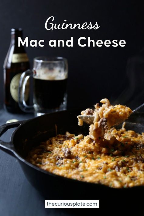 Spring is almost here, but it’s still cold enough to warm up with a hearty bowl of Guinness mac and cheese. And who am I kidding? Whether it’s winter, spring, summer or fall, I’m all about this beer mac and cheese with beef recipe. It’s especially perfect for St. Patrick’s Day – with a frosty glass of Guinness of course! Pop over to my site for the recipe! | dinner ideas | ground beef recipes | pasta recipes | st patricks day food | irish recipes | Guinness Mac And Cheese Recipe, Guinness Mac And Cheese, Mac And Cheese Beef, Dinner Ideas Ground Beef, Beer Mac And Cheese, Guinness Recipes, Skillet Mac And Cheese, Beef Skillet, Glass Of Beer