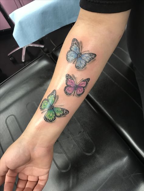 Butterflies colored with my kids birthstone colors . I've waited a long time for these tattoos. Birthstone Butterfly Tattoos, Heart Tattoo With Butterflies, Butterfly Tattoos With Color, Butterfly Tattoo With Color, Birthstone Tattoo Ideas, Birthstone Tattoos, Colored Butterfly Tattoo, Color Butterfly Tattoo, Wrist Tats