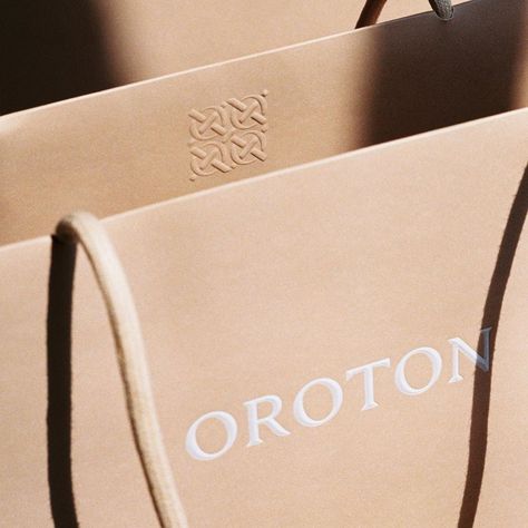 A modern take on heritage for Australian luxury brand Oroton by Y-M-D Studio #branding #brandidentity #packaging #design #typography #graphicdesign #luxury #visualidentity Bag Packaging Design, Luxury Paper Bag, Store Packaging, Shopping Bag Design, Paper Bag Design, Luxury Packaging Design, Collateral Design, Embossed Bag, Packaging Labels Design