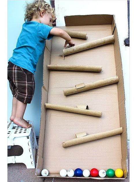 Say goodbye to fancy and expensive toys and say hello to saving some money. Check out our list of cool toys made from cardboard boxes and lots of creativity Ball Run, Homemade Toys, Boredom Busters, Toddler Fun, Cardboard Crafts, Business For Kids, Diy Toys, Cardboard Box, Craft Activities