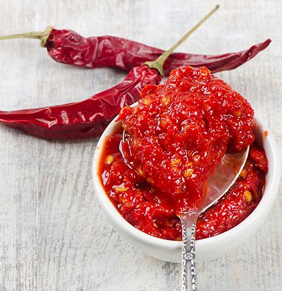 Harissa 		 		A flavorful spicy Tunisian condiment. Serve at the table as an accompaniment to meat or fish, the heighten the flavor of salads, o Harissa Recipes, Pepper Sauce Recipe, Tunisian Food, Harissa Paste, Indian Recipe, Low Carb Diet Recipes, Chili Peppers, Arabic Food, African Food