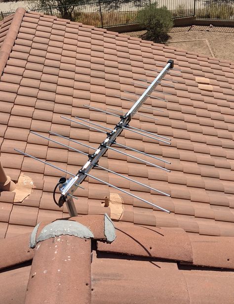 Installed a long range directional TV antenna on this two story home in Anthem, AZ. Affixed a U-bracket with pole to the wood facia under the tile. Ran the coax cable to the structured wiring panel in the downstairs laundry room. Utilizing a 3-way splitter distributed the TV signal to each television location. Stop Monthly TV Payments! www.freehdtvaz.com Outdoor Tv Antenna, Structured Wiring, Hdtv Antenna, Outdoor Tv, Tv Antenna, Two Story Homes, Laundry Room, Outdoor Power Equipment, Tile