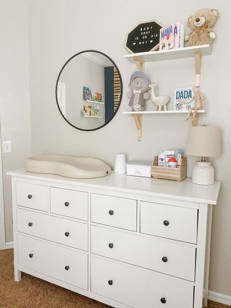 #babygirlroom #nurserydecor #nursery #nurseryideas Nursery Open Shelving, Nirsery Changing Table, Ikea Hemnes Dresser Changing Table, Nursery Table Decor, Nursery Change Table Dresser, Nursey Dresser, Nursery Shelves Over Changing Table, Nursery Changing Dresser, Shelves Above Dresser Nursery