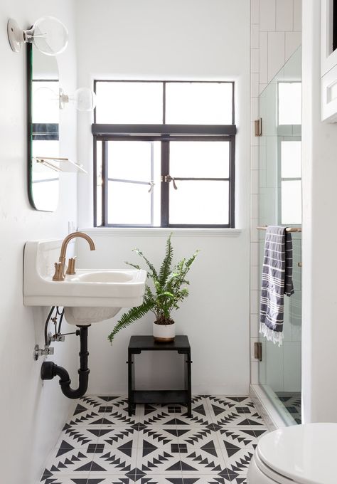 Dwell - Before & After: A Creative Couple Give Their Spanish Revival Home a Punchy Upgrade Spanish Bathroom Ideas, Modern Spanish Revival, Spanish Style Bathrooms, Spanish Bathroom, Cement Tile Floor, Spanish Revival Home, Spanish Modern, Timeless Bathroom, Floor Tile Design