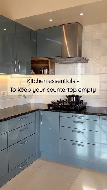 Saavi Design Studio on Instagram: "Kitchen essentials: For this kitchen renovation, the space was a major constraint, due to the presence of certain additional appliances like Flour Grinder etc, causing inconvenience in operating the Kitchen. Hence, the main aim for this kitchen design was to keep the countertop empty at all times and create storage spaces for all equipments, making it functional and super easy to operate. A big thank you to our client @devikondoju for showing us how these Indian Kitchen Design Ideas With Black Countertop, Indian Kitchen Countertops, Wet Grinder Storage Ideas In Kitchen, Matka Stand In Kitchen, Mixer Grinder Storage Ideas In Kitchen, Indian Kitchen Countertops Organization, Kitchen Interior Indian, Flour Grinder, Indian Kitchen Interior