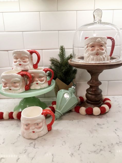 An epic journey resulted in Santa mugs and this cute display.  ♥️💚🎅🏻🌲  (📸 jen_designer via Instagram) Santa Mug Decor, Santa Mug Display, Vintage Santa Mugs, Apothecary Ideas, Gingerbread Kitchen, Friends Playing, Christmas Miracle, Vintage Christmas Crafts, Santa Mug