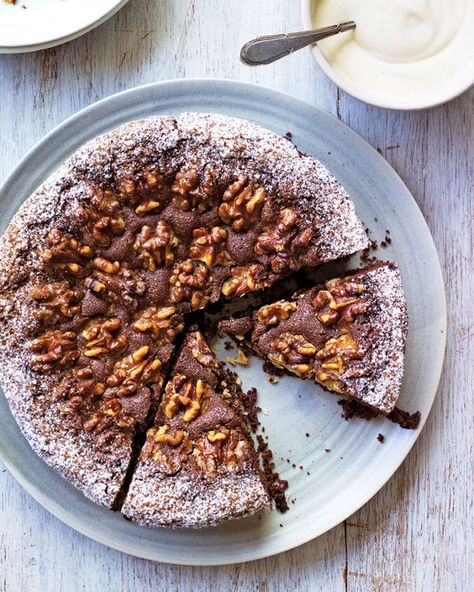 Eric Lanlard's take on classic Swiss chocolate cake, topped with toasted walnuts and a dusting of cocoa powder, is the perfect addition to afternoon tea. Swiss Chocolate Cake, Winter Cakes, Chocolate Cake Recipes, Coffee And Walnut Cake, Afternoon Tea Recipes, Swiss Chocolate, Walnut Cake, Delicious Magazine, Caster Sugar