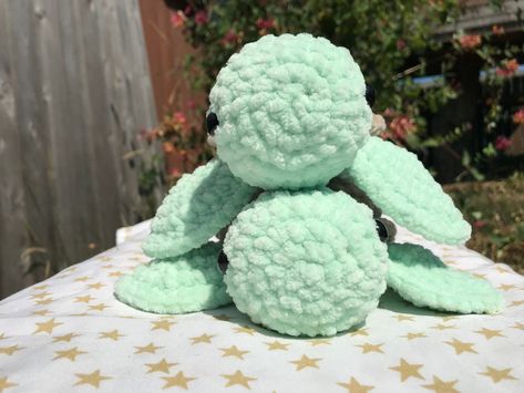 Crocheted baby sea turtle!  The pictures look more vibrant because they were taken outside.  ( they were not edited) I do not recommend putting this in the washer or giving it to a baby.  The size might be bigger or smaller due to tension.  I used safety eyes, but if you really try you could probably get them out.  This pattern is by: crochet by Genna Crochet By Genna, Yarn Plushies, Crochet Stuffys, Cute Crochet Turtle, Turtle Plushie, Super Cute Crochet, Plushie Crochet, Baby Sea Turtle, Easy Crochet Animals