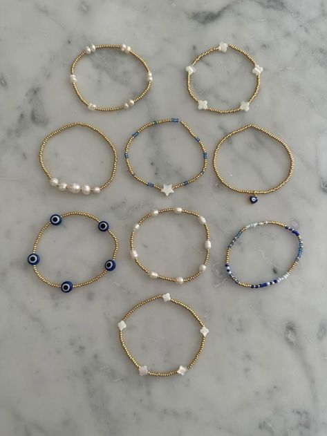 Bracelet Inspo Preppy, Where To Buy Bracelets, Preppy Gold Bracelet Stack, Blue And Gold Beaded Bracelets, Perment Jewelry, Bracelet Ideas Aesthetic Beaded, Gold And Blue Bracelet, Blue Bracelets Diy, Gold Jewelry Stack Bracelet