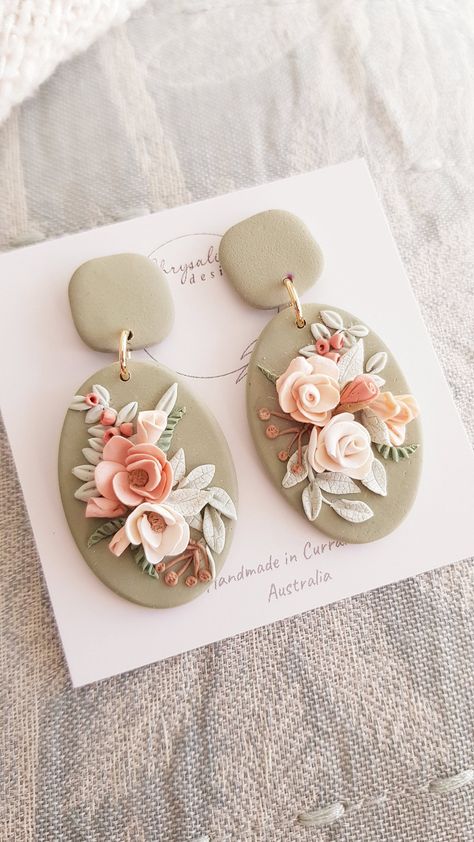 Beautiful large oval sage green earrings featuring pastel rose bouquets in delicate creams and salmon. Perfect spring bridal earrings or a unique gift for her. Dainty and delicate with loads of fine detail.  The earrings have matching sage green studs and hypoallergenic findings. They are very lightweight and comfortable to wear.  The total length is approximately 5cm and they measure 2.5cm across. Clay Mixing, Polymer Clay Recipe, Clay Embroidery, Small Flower Earrings, Floral Polymer Clay, Polymer Flowers, Clay Making, Clay Works, Polymer Clay Flower Jewelry