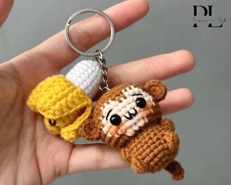 Crochet Monkey With Banana Keychain, Amigurumi Monkey, Crochet Baby Monkey Plush Toy Keychain, Monkey Stuffed Animal, Monkey Cute Gifts CUTE MONKEY WITH BANANA KEYCHAIN Materials: This lovely animal amigurumi is crocheted with cotton yarn, soft for skin. Cute mini monkey keychain is meticulously handcrafted by hand This cute baby monkey and banana amigurumi measures about 6cm in length CUTE GIFT FOR YOUR LOVERS If you are looking for a meaningful handmade gift, this little monkey keyring will be Banana Keychain, Monkey With Banana, Monkey Bag, Monkey Cute, Monkey Amigurumi, Amigurumi Monkey, Monkey Crochet, Mini Monkey, Keychain Amigurumi