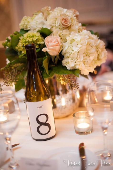 Wine Theme Wedding Ideas: Use old wine bottles for table numbers.  Photo by Rachael Foster Photography  Floral Centerpiece by Chris Johnson Theme Wedding Ideas, Medium Bouquet, Wine Theme Wedding, Wine Bottle Table, Wedding Burlap, Wine Bottle Centerpieces, Old Wine Bottles, Romantic Wedding Receptions, Chris Johnson