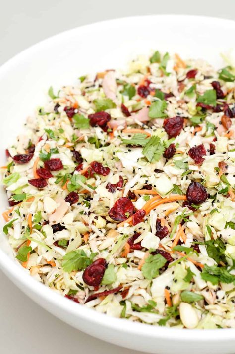 Asian Chicken Cranberry Salad, a delicious salad or main dish that is popular at any potluck or holiday party! Made with rotisserie chicken, cranberries, sliced almonds, and sesame sticks, and a tasty Asian dressing. #asiansalad #chickensalad Unique Chicken Salad Recipes, Chicken Cranberry Salad, Chicken Cranberry, Cranberry Salad Recipes, Asian Chicken Salads, Recipes Asian, Linda Carter, Cranberry Salad, Salad Recipes Video