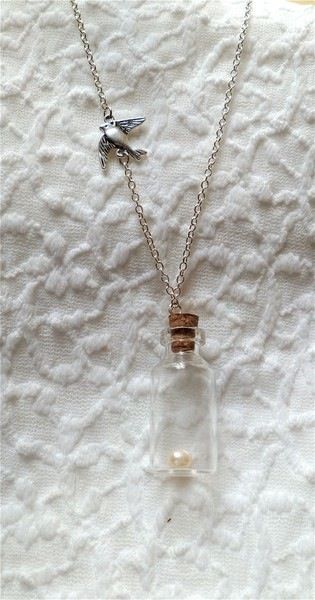 cutest Hunger Games necklace i've seen :) Hunger Games Accessories, Hunger Games Bracelet, Hunger Games Jewelry, Marvel Jewelry, Katniss And Peeta, Hunger Games 3, Hunger Games Series, Mini Bottle, Hunger Games Catching Fire