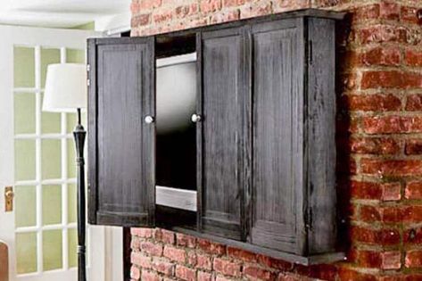 DIY TV Cabinet from thisoldhouse.com Tv Cover Up, Hide Your Tv, Hidden Tv Cabinet, Patio Tv, Best Tv Wall Mount, Outdoor Tv Cabinet, Tv Enclosure, Hanging Tv On Wall, Outdoor Tv Covers