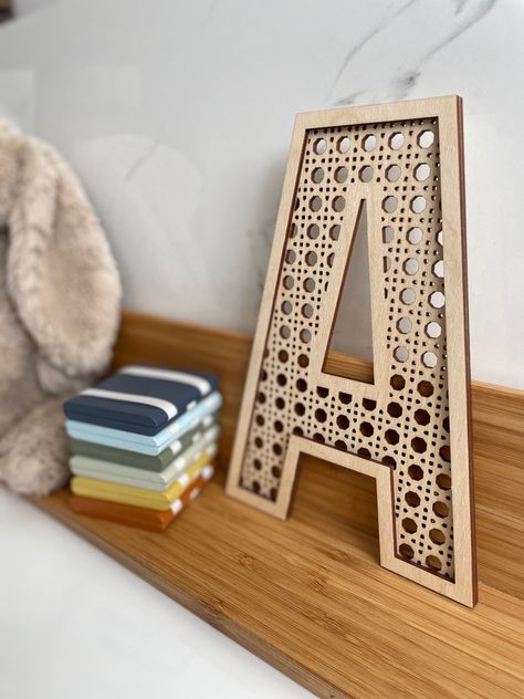 Rattan cane look wooden letter. Letter shown is capital A in natural birch ply on a shelf with a bunny and colourful wooden blocks. Horse Trainer Gifts, Basketball Coach Gifts, Baseball Ornaments, Rattan Cane, Laser Ideas, Wood Serving Board, Horse Ornaments, Nursery Letters, Wooden Letter