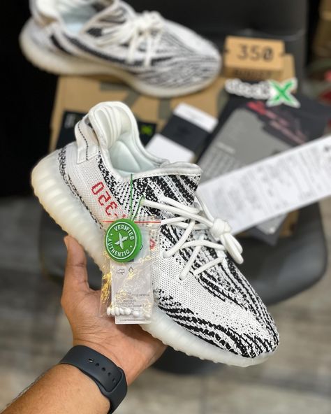 Yeezy 350 V2 SPLY Zebra features a distinctive black and white striped Primeknit upper with the iconic red “SPLY-350” branding. Debuted in 2017, this striking design quickly became a fan favorite, celebrated for its unique look and premium comfort. The Zebra colorway is one of the most recognizable in the Yeezy 350 V2 lineup, cementing its place in sneaker history. #Yeezy350V2 #SPLYZebra #KanyeWest #AdidasYeezy #SneakerCulture #YeezyBoost #Streetwear #Sneakerheads Sply 350, Yeezy 350 V2, Yeezy 350, 350 V2, Yeezy Boost, Zebras, Adidas Yeezy, Kanye West, A Fan