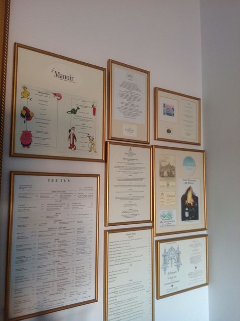 Wall of framed menus as a memento of favourite restaurants and special experiences Gallery Wall In Restaurant, Framed Menus Kitchen, Menu Gallery Wall, Menu Wall, Framed Recipes, Moving Ideas, Wedding Food Menu, Memory Table Wedding, Menu Display