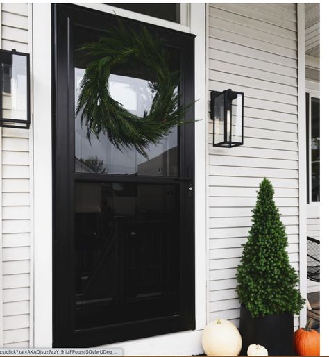 Love this black on black storm door Bungalow Front Door, White Storm Door, Black Screen Door, Front Porch Refresh, Front Door White, Porch Refresh, Black Front Door, Front Porch Lighting, White Exterior Houses