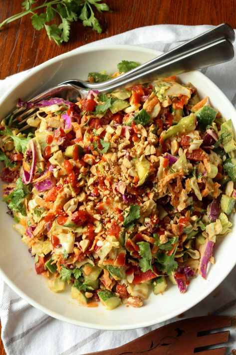 Eat the rainbow with this beautiful, Thai-style Rainbow Crunch Salad tossed in deliciously spicy peanut dressing! A fresh and easy side dish. Chickpea Rainbow Crunch Salad, Thai Rainbow Salad, Super Crunch Salad, Spicy Peanut Dressing, Thai Crunch Salad, Crunch Salad, Keto Salad, Rainbow Salad, Hearty Lunch