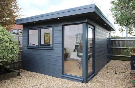 Garden office with bike storage room. Clad with low maintenance composite wood cladding the interior is a high spec plastered and decorated finish. Summer House With Storage, Composite Cladding Garden Room, Composite Cladding Exterior, Cladding Extension, Shed Cladding, Garden Office Ideas, Bike Storage Room, Plastic Cladding, Outside Lighting