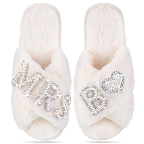 PRICES MAY VARY. Letters Bridal Slippers: our wedding slippers are designed in a variety of letter styles, you can choose your personalized initial slippers, and they are suitable for bridal shower, bridesmaid party, bridal party, also ideal for sleeping, bathing and leisure, comfortable and wear resistant, let you wear the feeling of clouds, white fluff and shining rhinestones can easily match your morning gown, let you shine at any time One Size Fits Most: the bride slippers measure about 9.65 Wedding Slippers For Bride, Wedding Day Letter, Pearl Slippers, Slippers Wedding, Bridesmaid Slippers, Bridal Slippers, Bride Slippers, Shower Slippers, Women Slippers Fashion