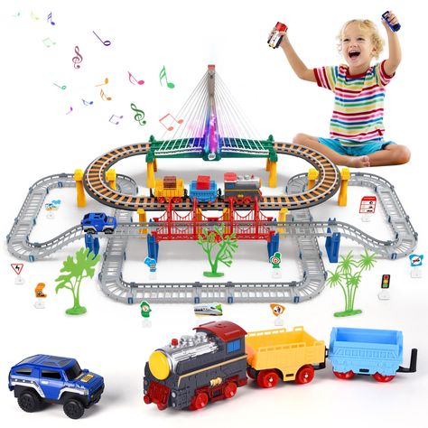 PRICES MAY VARY. Train toy and race track car set: The toy train set include 140PCS accessories. This set is not just about trains; it's an all-in-one adventure. In addition to the extensive train tracks, we've included an exciting car track complete. Your child can switch between modes for a diverse and engaging play experience. Rich and Diverse: Your child's imagination will run wild with the rich variety of tracks and accessories included in this set. Whether it's building complex railway sys Toy Race Track, Race Car Track, Toy Trains Set, Race Tracks, Electric Train, Track Car, Construction Toys, Train Set, Train Tracks