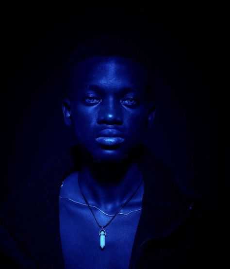 Blue Light On Black Skin, Blue Gel Photography, Blue Toned Photography, Blue Light Photography Portraits, Blue Lighting Photoshoot, Dynamic Lighting Photography, Colour Gel Photography Studio Lighting, Blue Lighting Portrait, Glow In The Dark Photoshoot